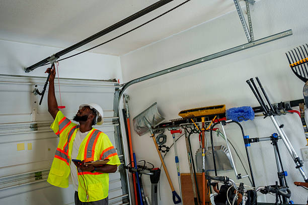 Professional Garage Door Panel Replacement technician working in Greenfield, IA